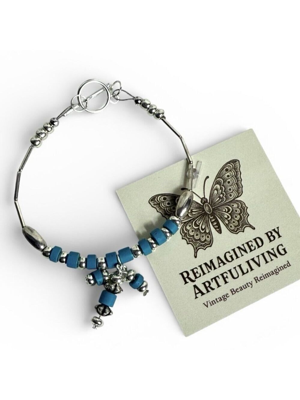 Reimagined Faux Turquoise Silver Tone Charm Bracelet